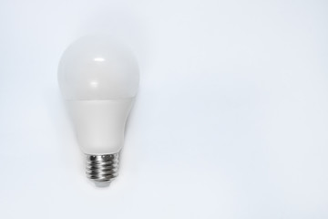 Light bulb on a gray background.