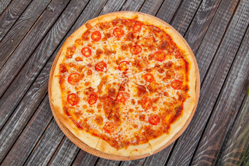  appetizing, fresh pizza on the table, for a design decoration in cooking