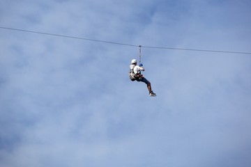 Boy on the rope in the sky