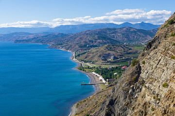 Fototapeta na wymiar Panorama of the Black Sea coast from the top of the coastal mountains.