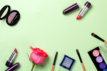 Obraz na płótnie Canvas Set of cosmetics on color background with flowers.