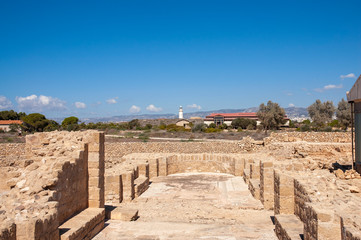 Fototapeta na wymiar Kato Pafos Archaeological Park and Paphos Lighthouse on the background, Paphos, Cyprus