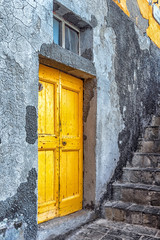 Painted Yellow Door Weathered and Rough