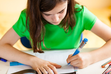 Girl doing homework at home