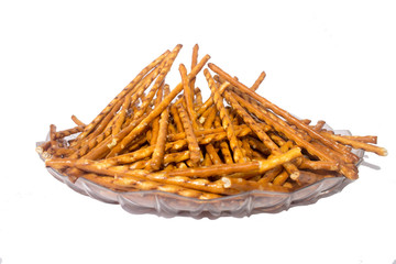 crispy tasty salty breadsticks on the plate