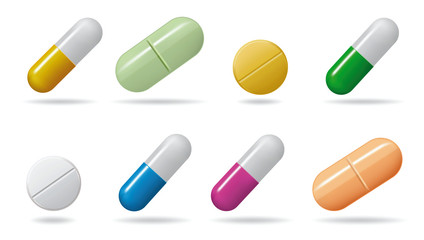 Medicinal tablets. Set tablets of different colors. Isolated objects on white background