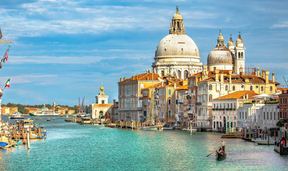 Naklejka premium Italy beauty, cathedral Santa Maria della Salute and gondola on Grand canal in Venice, Venezia
