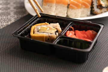 Trying ginger and wasabi for sushi