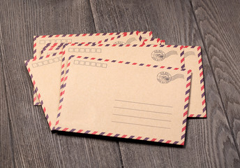 Envelope on a wooden background