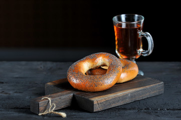 bagels with poppy seeds on a wooden Board