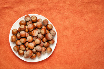 hazelnuts on a white plate