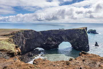 Famous rock formation on a Dyrholaey cape in south region of Iceland