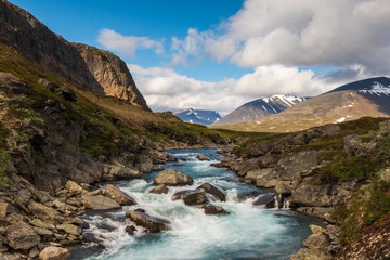 Flowing water in a river during the hike of Kungsleden (Kings path) in northern Sweden. 