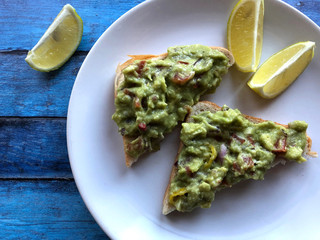Guacamole Toast slices.  Healthy lifestyle concept.
