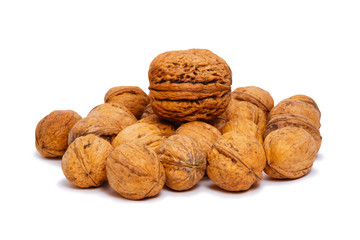 heap of walnuts isolated on a white background