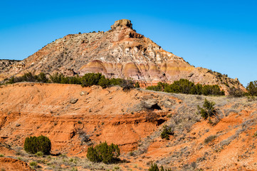 Fototapeta na wymiar Rock formations and natural geologic layering at Palo Duro Canyon State Park near Amarillo, Texas