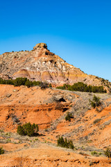 Fototapeta premium Natural rock formations and geologic layering at Palo Duro Canyon State Park near Amarillo, Texas