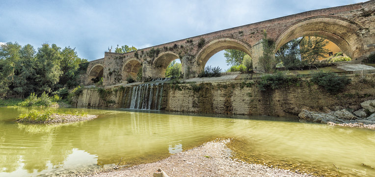 Meldola, Italy, bridge "Ponte dei Veneziani" was built in the fifteenth century and connects Bidente river with Ronco river