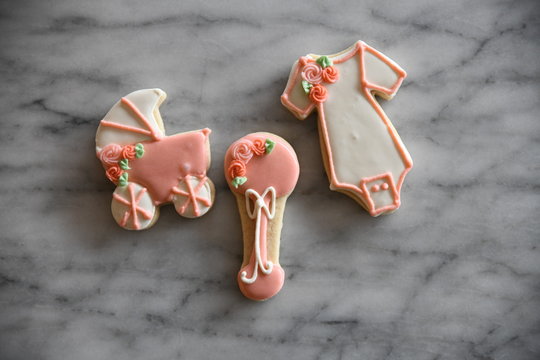 Cookies shaped like baby accessories