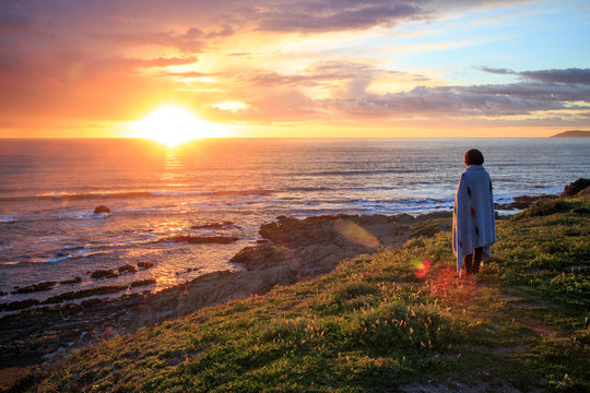 Adult looking out towards ocean