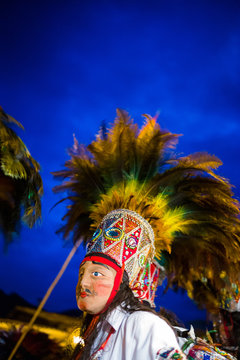 People wearing costumes for a Peruvian festival