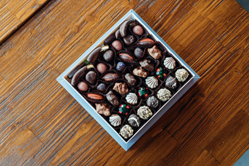 Handmade chocolates or candies in the box. This sweet chocolate gift are delicious, natural, organic luxury and healthy.