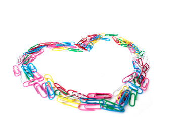 colorful cute heart from the paperclips on the white