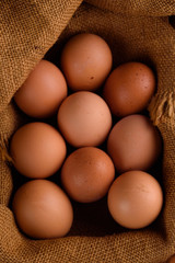 Fresh chicken eggs in burlap. Hen. egg. Easter.