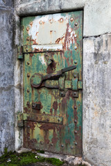 Rusting steel door inside Fort Worden - an abandonded WWI era military installation