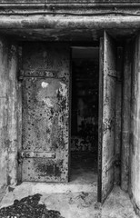 Fototapeta na wymiar Rusting steel door at Fort Worden - an abandonded WWI era military installation
