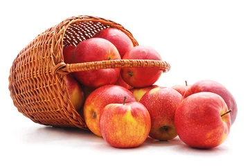 Fotobehang Red apples dropped out of the basket. © voren1