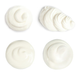 Set of delicious sour cream on white background, top view