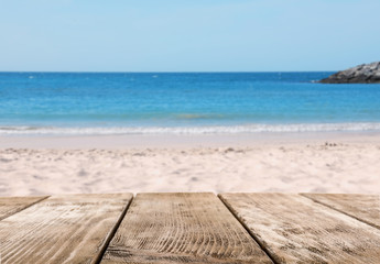 Fototapeta premium Picturesque view of sand beach and wooden walkway