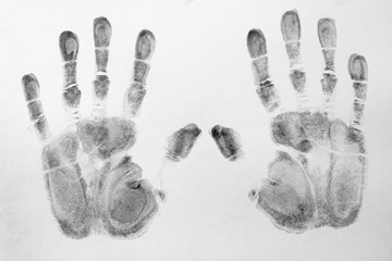 Print of hands and fingers on white background, top view