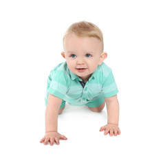 Cute little baby crawling on white background