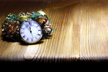 Christmas rural still life.Countdown to midnight. Retro-style watches counting the last minutes before Christmas or New Year