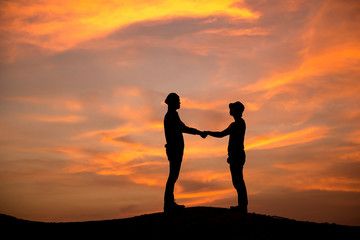 Silhouette couple at sunset