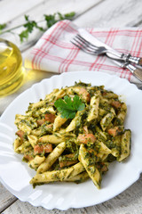 Penne pasta with spinach and meat