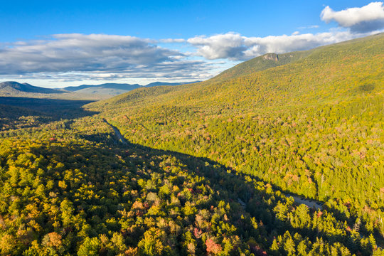 Aerial view of White mountain road (aka NH-16) on a sunny fall afternoon, in New Hampshire.