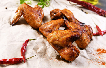 Roasted chicken wings in hot pepper