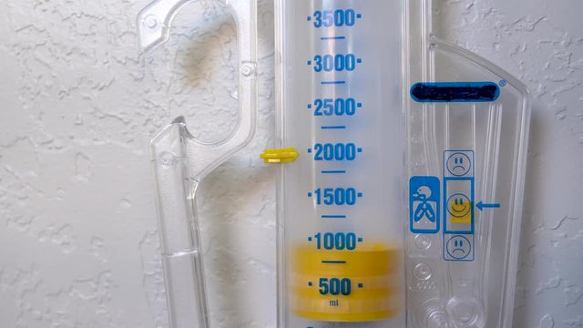 Closeup-Incentive spirometer being used to check lung capacity and exercise lungs