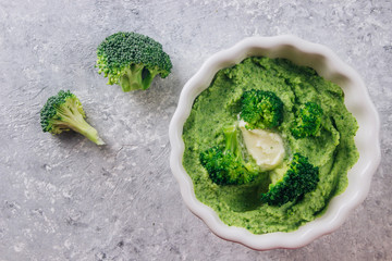 broccoli puree in a white bowl