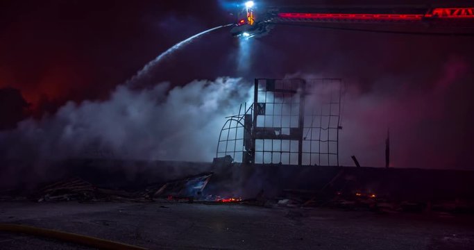 Extinguishing a building fire at night