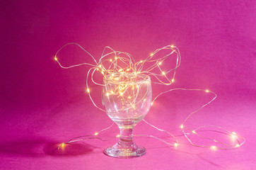 Light of small bulb in glass on beautiful background.