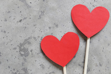 Obraz premium Red Heart paper on the concrete floor and have copy space.