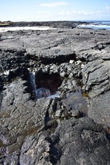 Water filling a crevice in the the lava field