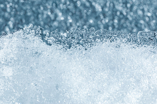abstract textured blue frosty background with melting snow © Mr Twister