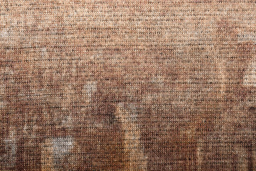 Abstract knitted fabric for backgrounds.Knitted texture.Grunge style