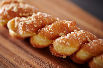 Twisted donuts on table 