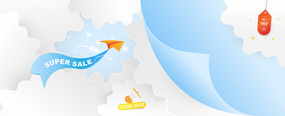 Banner for web page. Special offer Super Sale 50% Plane with a ribbon on the background of clouds cut out of paper and glowing lights. Concept with loudspeaker and label.